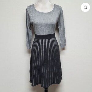 Calvin Klein.  Knit Dress with Swingy Pleated Skirt